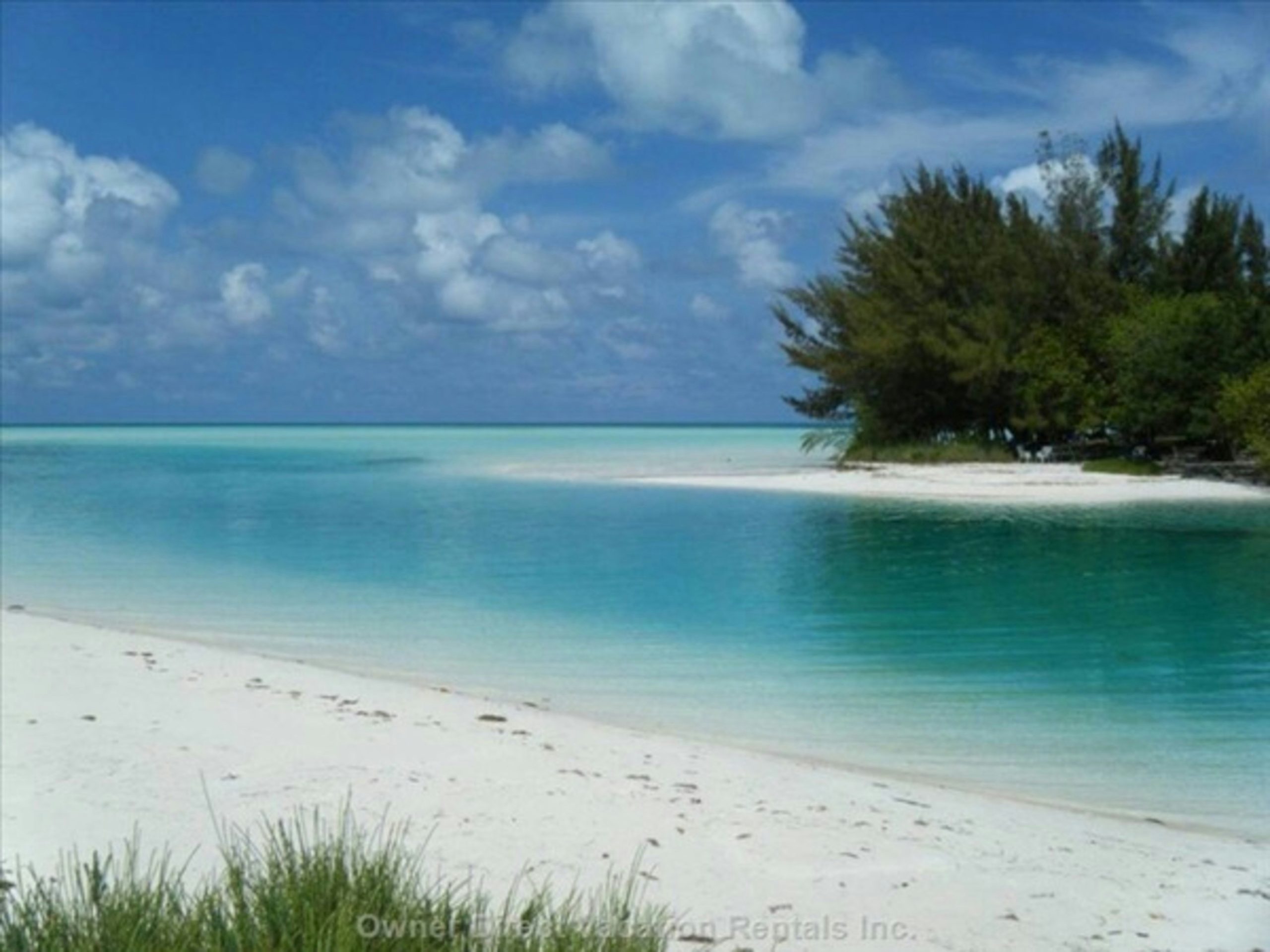 Secluded white sand beach and turquoise water in The Bahamas