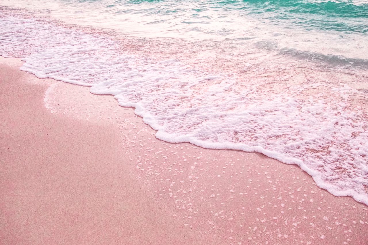 Pink sand beach and turquoise water in The Bahamas